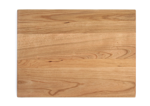 Wooden cherry hardwood cutting board on a white background