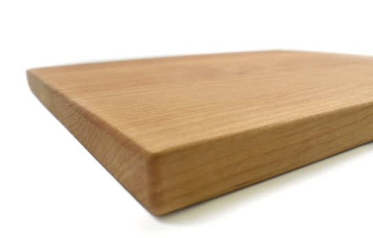 Cherry cutting board on a white background