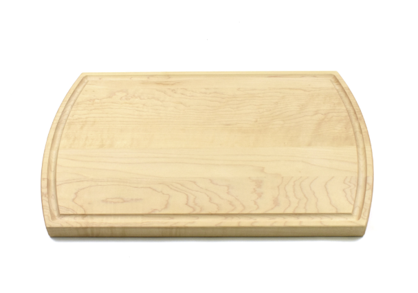 Wooden cutting board on a white background