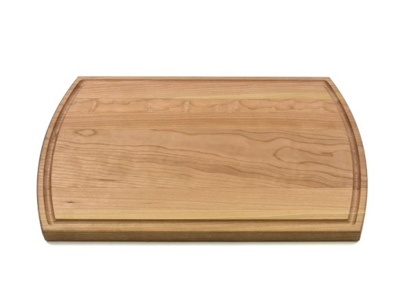 Wooden cutting board on a white background