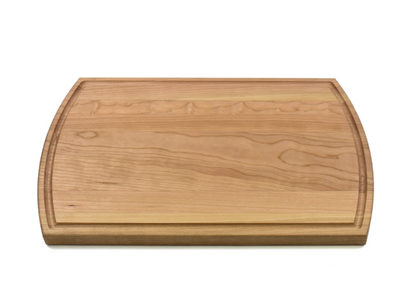 Wooden cutting board on a white background